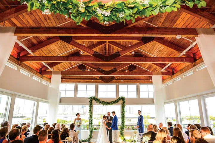 Wedding champagne tower with white flowers